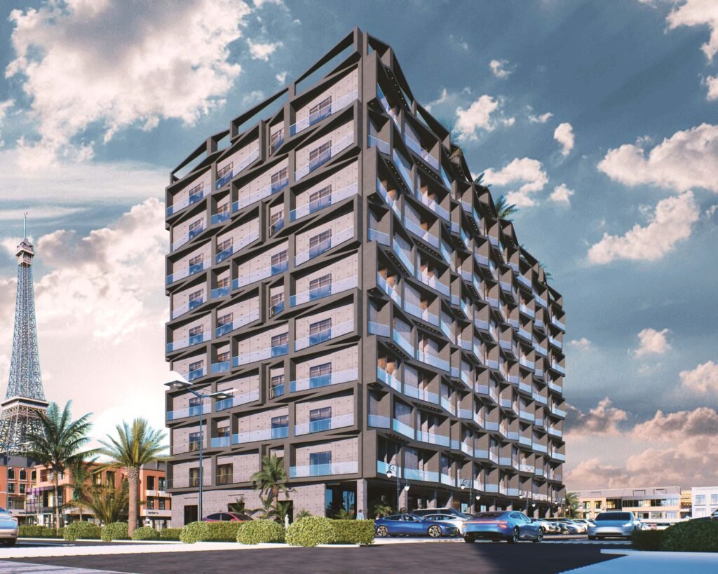 Side view of The Oasis Grand 14 building showing the signature inventory apartments with the Bahria Eiffel Tower visible in the background.